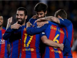 El famoso tridente del Barcelona ya está de vacaciones. AFP / J. Lago