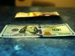 Se espera que el peso cotice entre 20.73 y 20.80 pesos por dólar. EL INFORMADOR / ARCHIVO