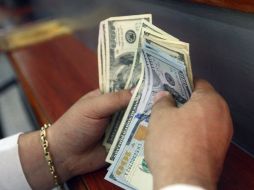 Bancos mexicanos colocan al dólar libre en una venta de 21.12 pesos. EL INFORMADOR / ARCHIVO