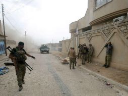 Las fuerzas progubernamentales alcanzaron su objetivo en la parte norte del barrio. AFP / A. Al-Rubaye