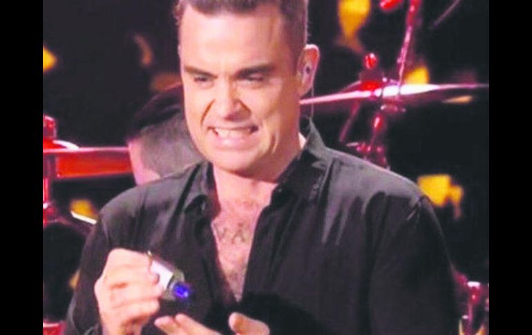 Robbie Williams. El actor protagonizó un momento bochornoso al final de uno de sus espectáculos. ESPECIAL /