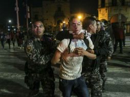 Día de manifestaciones. Tras dispersar una manifestación en Guadalajara, la FGE detuvo a cinco de los que protestaban. EL INFORMADOR / F. Atilano