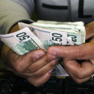 Dólar se dispara a 21.20 pesos, tras anuncio de Ford