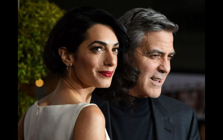 La pareja está implicada en la defensa de los refugiados. AFP /