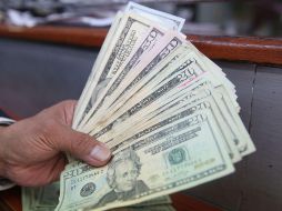 En bancos de la capital del país, el dólar libre cerró la sesión en un máximo de 21.91 pesos a la venta. EL INFORMADOR / ARCHIVO