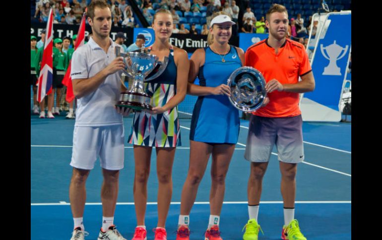 Los galos (I), que suceden en el palmarés a Australia, se llevaron la competición gracias a su victoria en dobles mixtos. AFP / T. Ashby