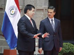 Cuando Cartes visitó México, se avanzó en un acuerdo para liberar el comercio entre ambos países que podría establecerse en septiembre. AP / ARCHIVO