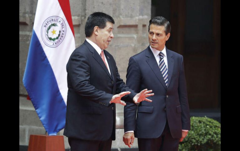 Cuando Cartes visitó México, se avanzó en un acuerdo para liberar el comercio entre ambos países que podría establecerse en septiembre. AP / ARCHIVO