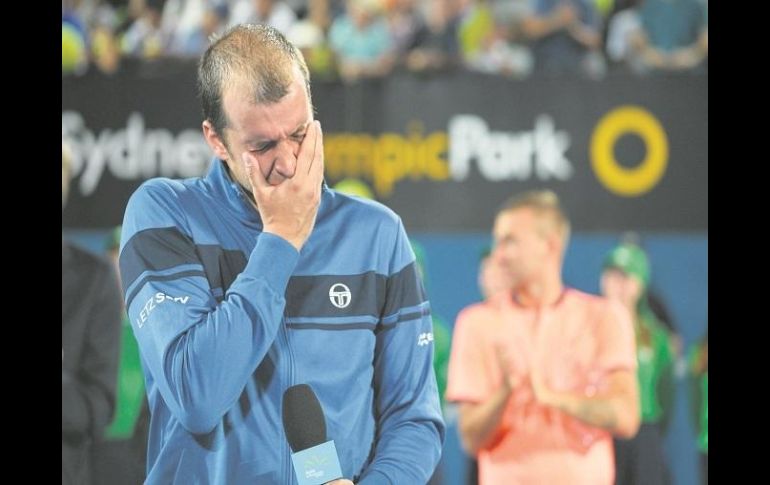 Conmovido hasta las lágrimas, Gilles Muller disfrutó de su primer título como profesional. AFP / P. Parks