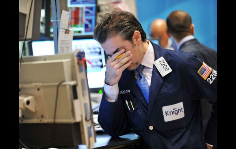 Wall Street regresa con números rojos después de un largo fin de semana por el feriado de Martín Luther King. AFP / ARCHIVO