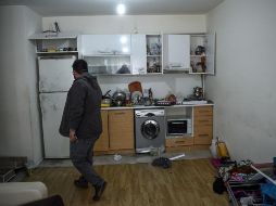 Autoridades registran el departamento donde ocurrió la detención de Abdulkadir Masharipov. AFP / O. Kose