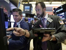 Wall Street cerró hoy en terreno mixto y el Dow Jones de Industriales, su principal indicador, cedió arrastrado por el petróleo. AP / ARCHIVO
