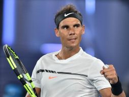Eficaz con el golpe de derecha, Nadal necesitó de dos horas y 13 minutos para ganar en la Rod Laver Arena. AFP / P. Crock