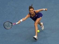 La polaca deja el camino para que su rival se mida en la siguiente fase a la griega Maria Sakkari. EFE / J. Castro