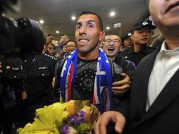 El argentino Carlos Tévez se ha convertido en el futbolista mejor pagado del mundo tras firmar con el Shanghái Shenhua. AP /