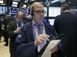 Wall Street vivió un jornada histórica en la que el Dow Jones tocó por primera vez los 20 mil puntos en la apertura de la sesión. AP / ARCHIVO