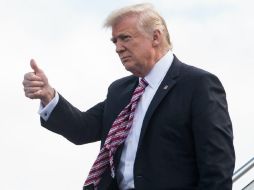 Trump señaló que si México no está dispuesto a pagar por el muro, Peña debería reconsiderar su viaje a EU. AFP / N. Kamm