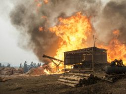 A la fecha suman 56 focos activos que afectan gran parte del territorio centro sur de Chile. AFP / M. Bernetti