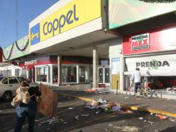 Tan sólo Coppel sufrió actos de rapiña en 69 de sus tiendas, de las cuales 22 fueron saqueadas completamente en todo el país. EFE / ARCHIVO