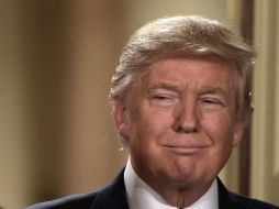 Las restricciones migratorias que anunció Trump son para mantener fuera del país a las ''personas malas'', asegura. AFP / B. Smialowski