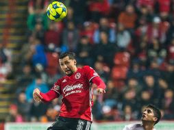 Antes de salir lesionado Corona contribuyó con uno de los tantos de Xolos. MEXSPORT / ARCHIVO