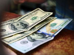 Los bancos de la Ciudad de México cotizaron el dólar en seis centavos menos respecto a la sesión anterior. EL INFORMADOR / ARCHIVO