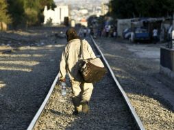 En cumplimiento de la promesa que hizo Trump, cientos de indocumentados son detenidos para luego ser deportados. EL INFORMADOR / ARCHIVO