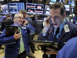 El Dow Jones terminó en 20 mil 412.16 puntos. AP / ARCHIVO