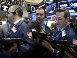 os operadores del parqué neoyorquino apostaron por las compras tras conocerse hoy que el IPC de Estados Unidos aumentó. AP / ARCHIVO