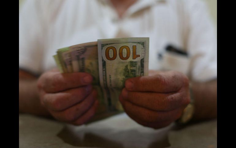 Merrill Lynch consideró que Trump ha suavizado en las semanas recientes su retórica en torno a la posible fiscalización de las remesas. EL INFORMADOR / ARCHIVO