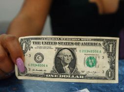La moneda de origen estadounidense obtuvo una variación a la baja de 13 centavos respecto al cierre anterior. EL INFORMADOR / ARCHIVO