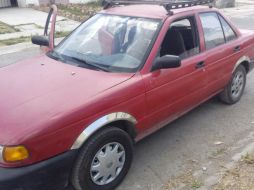 El cuerpo estaba en un automóvil Nissan Tsuru rojo en Monte Carmujo, al cruce con Sierra Calar, en Lomas del Mirador. ESPECIAL /