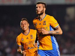 André-Pierre Gignac celebra tras anotar uno de los goles del partido. AFP / M. Class