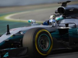 El finlandés Bottas ha firmado una vuelta espectacular casi a las tres horas de haberse abierto la pista. EFE / A. García