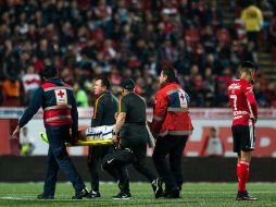 Después de la fuerte entrada de Orozco, Lozano tuvo que salir del partido. MEXSPORT / ARCHIVO