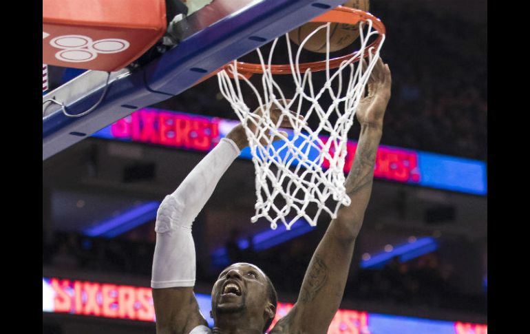 Caldwell-Pope encesta surante el primer cuarto del partido. AP / C. Szagola