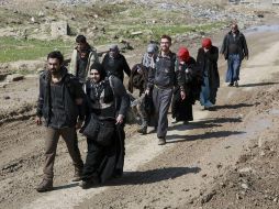 Los civiles desplazados han abandonado el oeste de Mosul  ante el accionar  de las fuerzas oficiales en la ciudad. AP / K. Mohammed