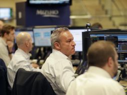 La jornada estuvo marcada ante la ceteza de que la semana próxima habrá un aumento en las tasas de interés de referencia. AP / M. Lennihan