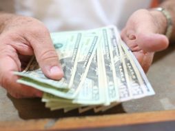 El Banco de México informa que el tipo de la moneda extranjera se ubica en 19.7974 pesos. EL INFORMADOR / ARCHIVO