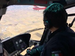 El helicóptero de la institución acompañó en el aire por varios minutos a la avioneta de dos plazas de color rojo. TWITTER / @PoliciaFedMx