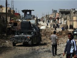 La fuerza aérea bombardeó varios almacenes de armas y munición, así como un centro de comunicaciones en los barrios de Al Qalaa. AFP / A. Al-Rubaye