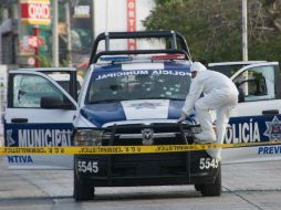 La zona fue acordonada por elementos de la Policía Federal y del Ejército Nacional para desactivar una granada que no explotó. AFP / ESPECIAL
