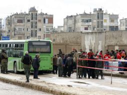 Cada grupo de evacuados estará compuesto por mil 500 personas, que incluirán entre 400 a 500 rebeldes. AFP / L. Beshara