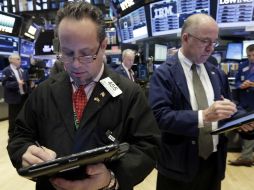 La sesión estuvo marcada por pendientes de las intervenciones de destacados miembros de la Reserva Federal. AP / R. Drew