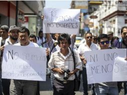 Los integrantes de la protesta demandaron a los tres niveles de gobierno a revisar la situación que viven los reporteros en la entidad. AP / F. Marquez