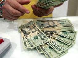 Estiman que el peso cotice entre 19.05 y 19.23 pesos por dólar en transacciones interbancarias a la venta. EL INFORMADOR / ARCHIVO