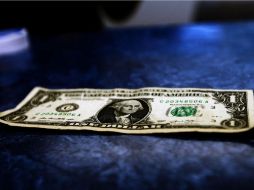 La divisa de origen estadounidense se adquirió en cuatro centavos menos respecto al día de ayer en bancos de la capital del país. EL INFORMADOR / ARCHIVO