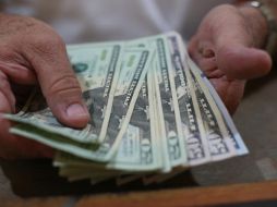 La divisa de origen estadounidense en recientes jornadas se ha mantenido por debajo de los 20 pesos. EL INFORMADOR / ARCHIVO