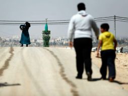 El arreglo incluye  un alto el fuego de nueve meses que todas esas áreas, así como en algunos barrios vecinos. AFP / T. Coex