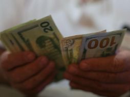 La moneda de origen estadounidense cedió 28 centavos al cierre de la sesión cambiaria. EL INFORMADOR / ARCHIVO